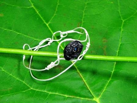 Tourmaline Bracelet - silver wire handcrafted frame with a rough natural black Tourmaline gemstone and a smoky blue Czech crystal