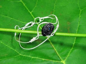 Tourmaline Bracelet - silver wire handcrafted frame with a rough natural black Tourmaline gemstone and a smoky blue Czech crystal